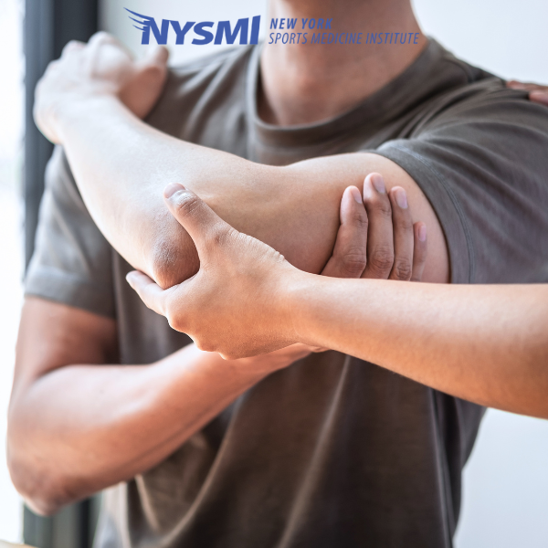 A person receives assistance stretching their arm, with the New York Sports Medicine Institute (NYSMI) logo visible at the top.